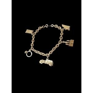 Avon Vintage 1991  “Have It All” Charm Bracelet Ring/Gold Bar/Boat/Car